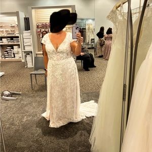 Never worn or altered wedding dress